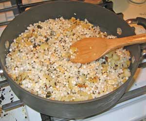 Sabudana with nuts and potato being cooked