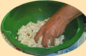 Sabudana dough being kneaded, then spiced & shaped for frying
